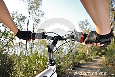 Sportsman riding mountain bike