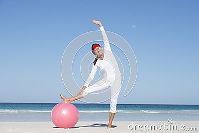 Sporty senior woman active at beach