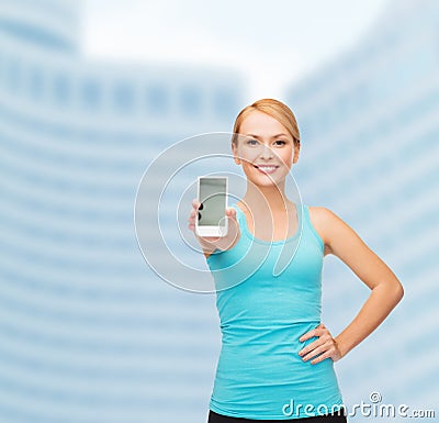 Sporty woman with smartphone