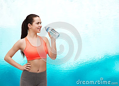 Sporty woman with water bottle