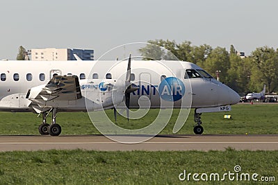 SprintAir Saab 340 aircraft running on the runway