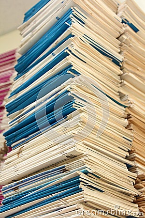 Stack of files full of documents