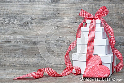 Stack of gift boxes with ribbon and bow