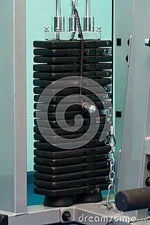 Stack metal weights in gym equipment