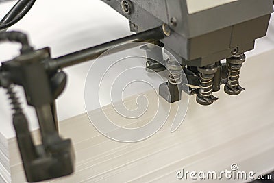 Stack of paper on an offset press