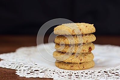 Stacked apple chip cookies on white rustic napkin - 1