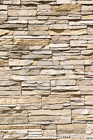 Stacked stone wall background vertical