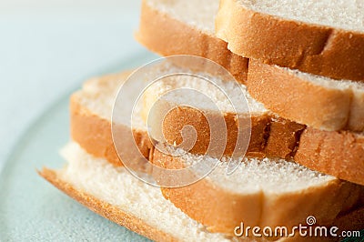 Stacked white bread slices