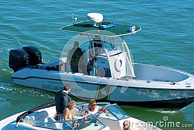 State law enforcement police boat stopping a boat