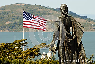 Statue of Christopher Columbus and USA flag