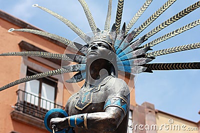 Statue of indian in the colonial city, Mexico.