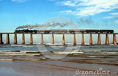 Steam train crossing Kaaimans River bridge South Africa