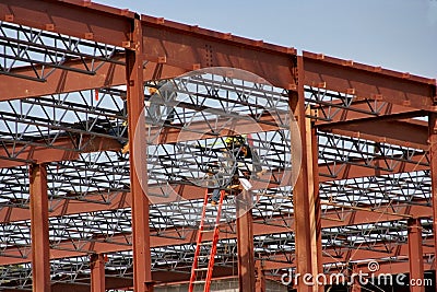 Steel workers on a construction job site