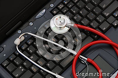 Stethoscope on a computer keyboard