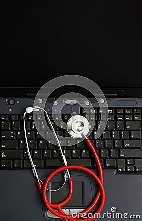 Stethoscope on a computer keyboard