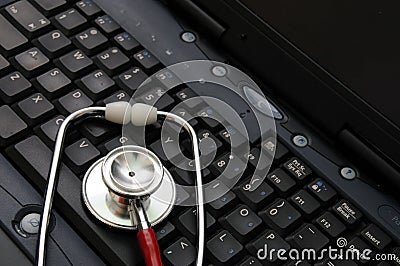 Stethoscope on a computer keyboard