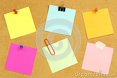 Sticky notes on bulletin board