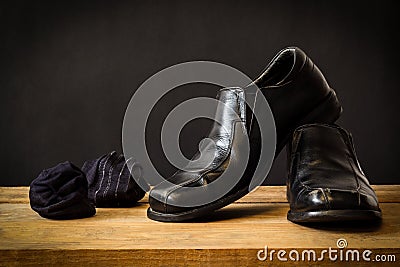 Still life with black man s shoes and socks