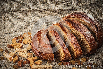 Still-life with loaf of bread, raisins, hard chuck