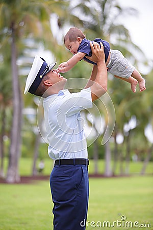 Stock image of a military dad with his son