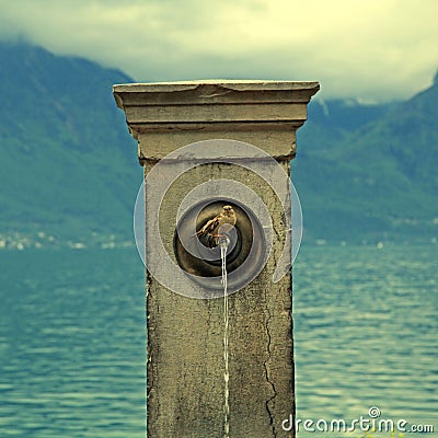 Stone fountain with bird, Lake Geneva