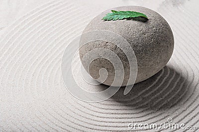 Stone in the garden of stones on sand