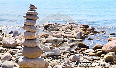 Stone pillar, relaxing by the lake