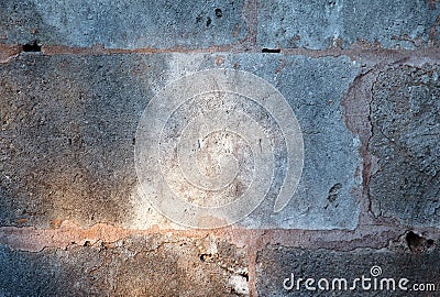 Stone wall with sunshine for background