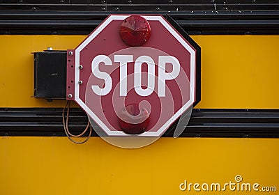 Stop sign on side of school bus