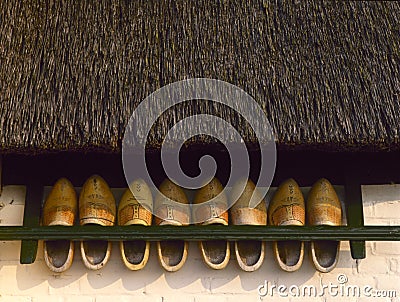 Royalty Free Stock Images: Storage rack with wooden shoes
