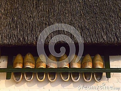 Storage rack with wooden shoes