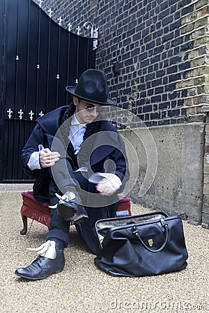 Strange man wearing black coat