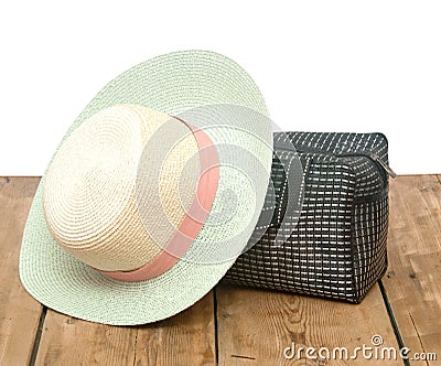 The straw hat and handbag