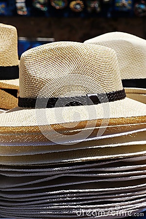 Straw hats, stacked