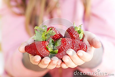 Strawberry in hand