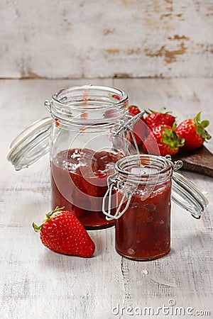 Strawberry jam in preserving glass