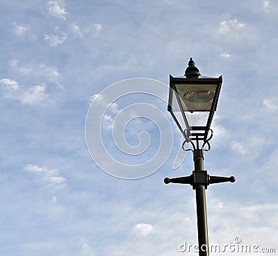 Street light Blue skies and clouds