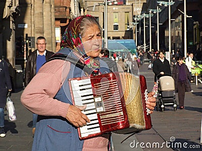 Street musician playing accordion