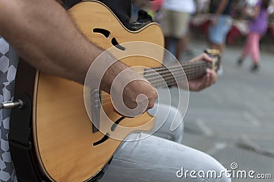 Street performer with guitar