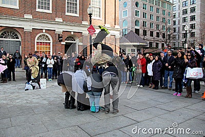 Street performers entertaining visitors,Boston