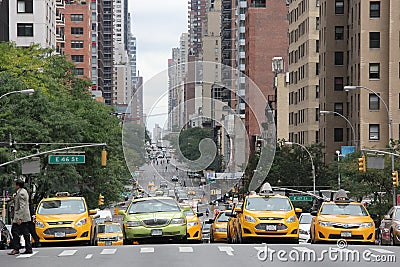 Street Scene of four taxis Stopped at Intersection in New York City, New York, September 2013