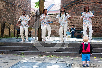 Street singers performing in historical city of York, England