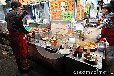 Street venders selling food at night in HK