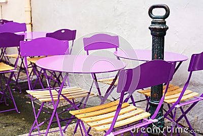 Street view of a cafe terrace with empty tables and chairs, Prov