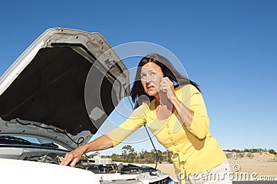 Stressed woman car breakdown