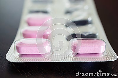 Strip of pink pills