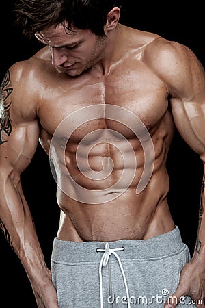 Strong Athletic Man Fitness Model Torso showing six pack abs.