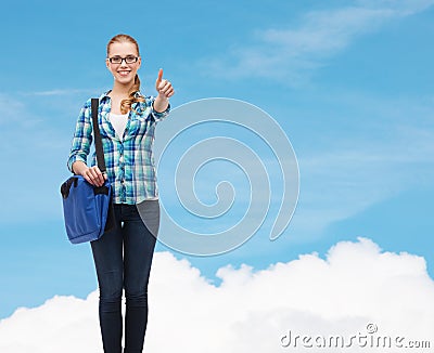 Student with laptop bag showing thumbs up