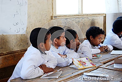 Students in classroom sitting on their disks