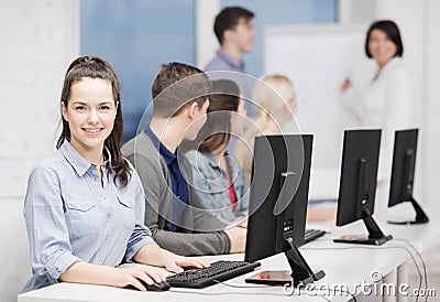 Students with computer monitor at school
